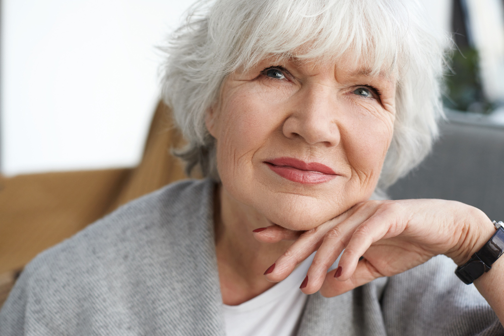 close-up-portrait-of-beautiful-positive-middle-aged-caucasian-lady-on-retirement-daydreaming-at-home-thinking-about-her-grandchildren-elegant-gray-haired-grandmother-spending-time-indoors.jpg