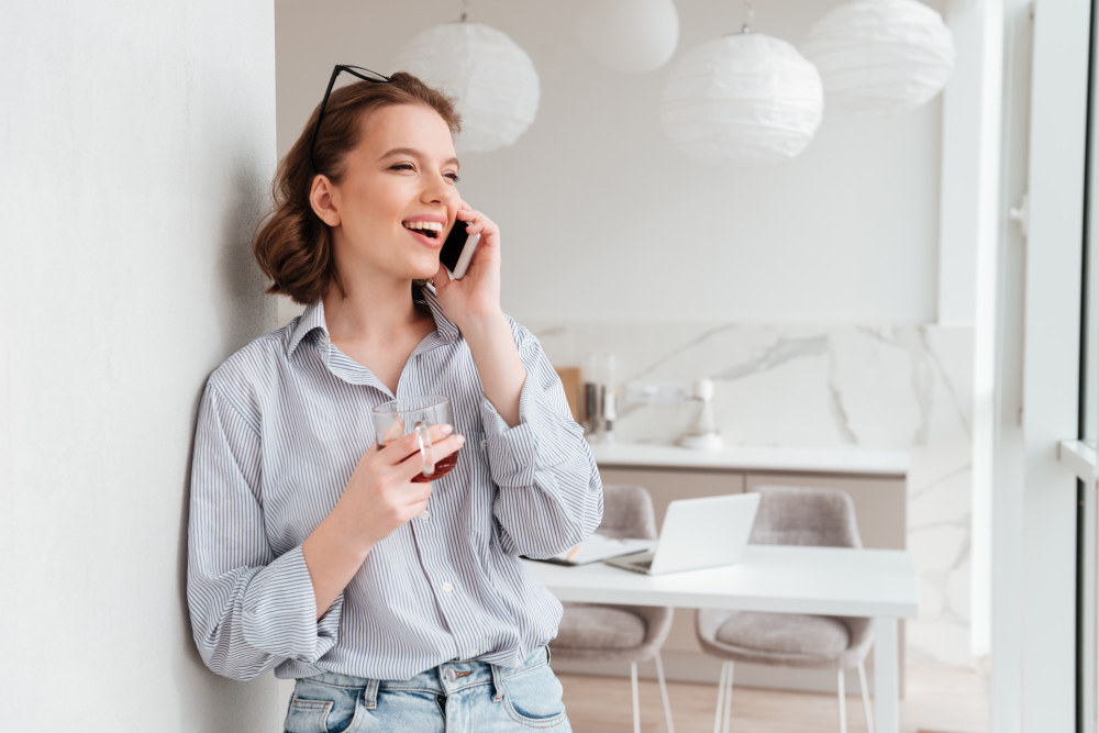 portrait-of-happy-excited-woman-talking-on-mobile-phone.jpg